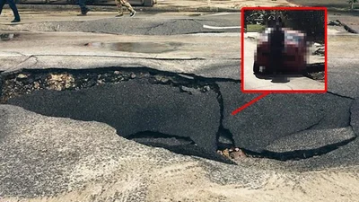 Киеве авто провалилось в огромную яму: Фото