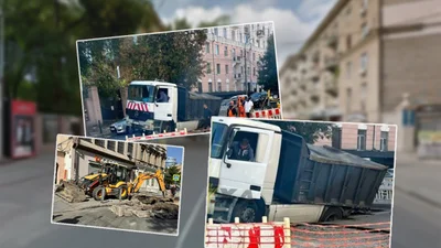 Аварійна машина у Дніпрі провалилась у яму, яку мала ремонтувати: фото