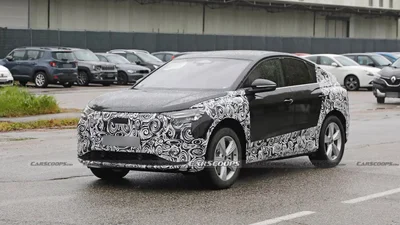 Шпигуни помітили оновлений Audi Q4 e-tron: фото - Auto24